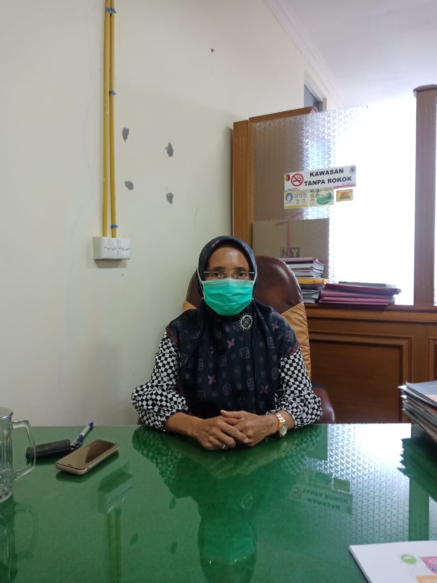 Keterangan Foto : Plt Kepala Dinas Kesehatan Kota Solok