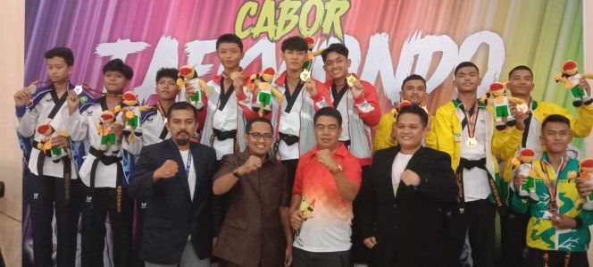 
 Ketua Koni Kuansing Andi Cahyadi Apresiasi Cabor Taekwondo Berhasil Menjadi Juara Umum